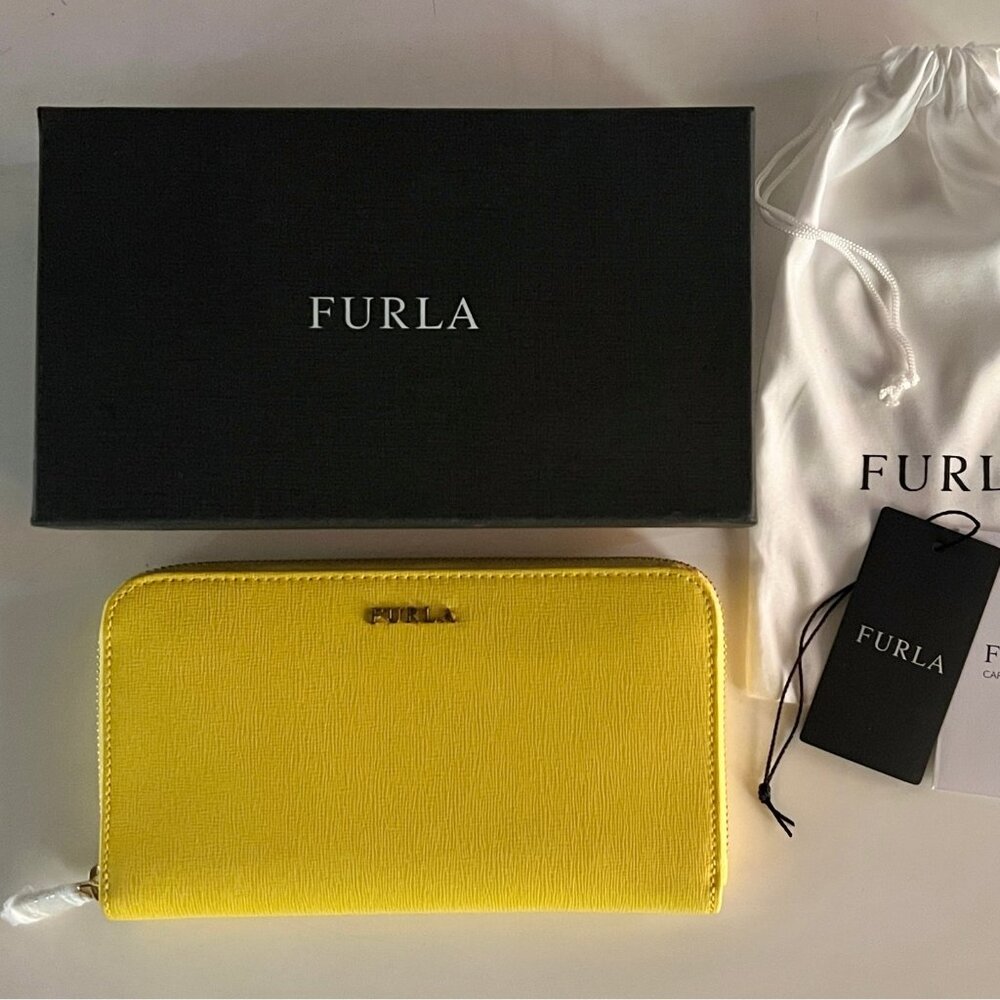 Furla extra large zip around leather wallet. Brand new with tags in box